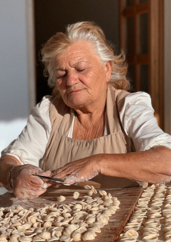 A woman making orecchiette by hand at a farm near Ostuni in Puglia