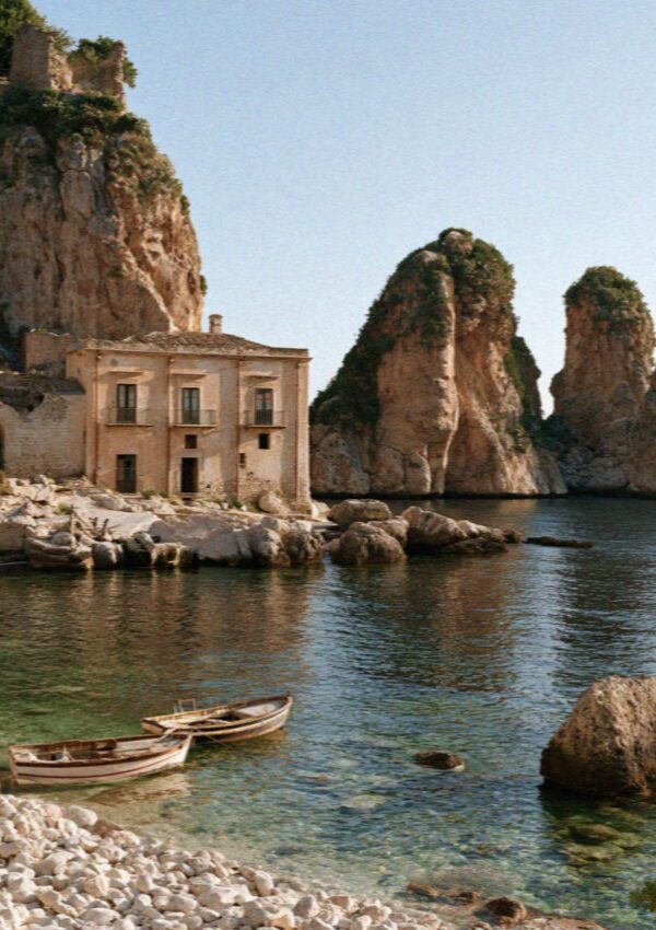 The old tonnara and the limestone sea stacks at Scopello, west of Palermo in Sicily