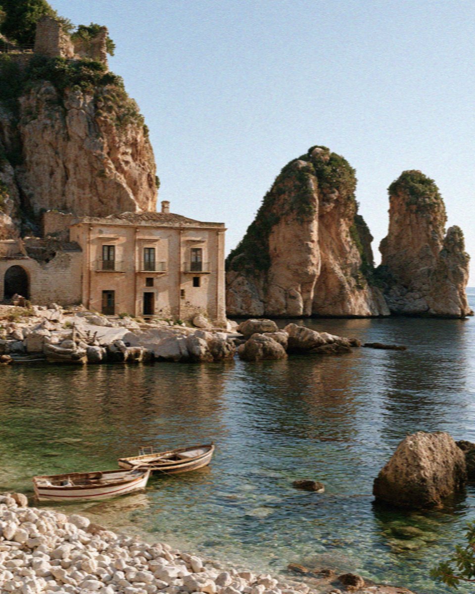 The old tonnara and the limestone sea stacks at Scopello, west of Palermo in Sicily