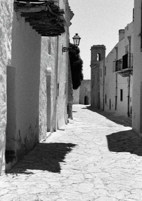 A narrow white lane at Scopello in black and white, west of Palermo in Sicily