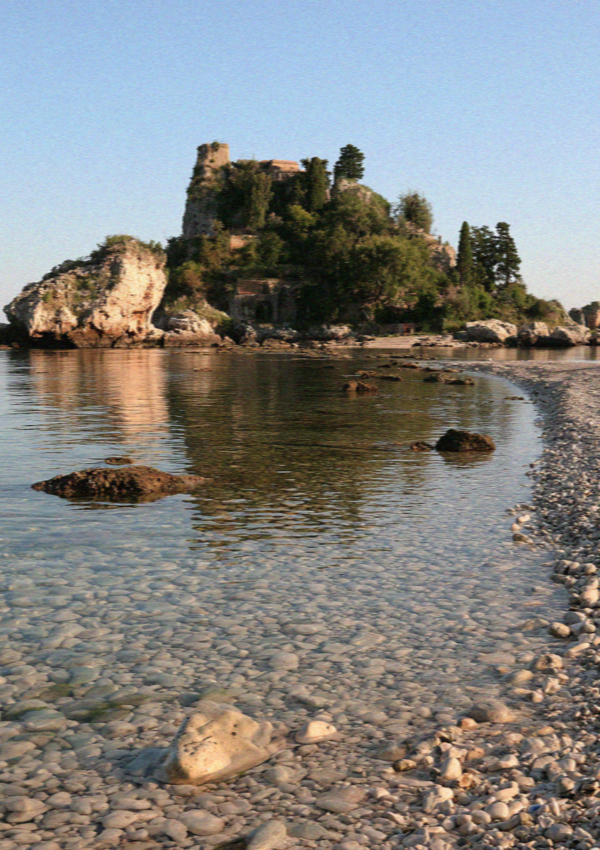 Isola Bella in the bay below Taormina in Sicily seen from a boat