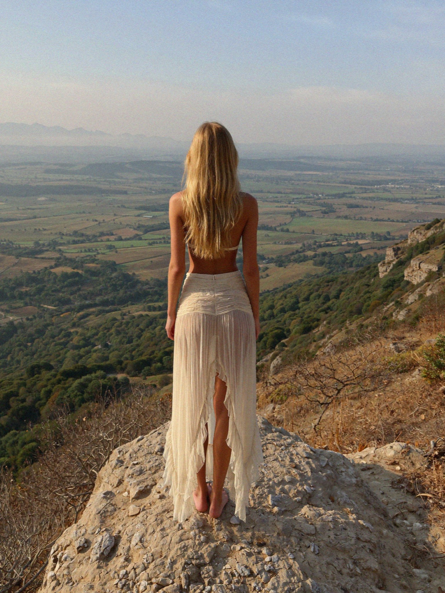 Victoria van der Berg above the valley on the descent in the interior of Corsica