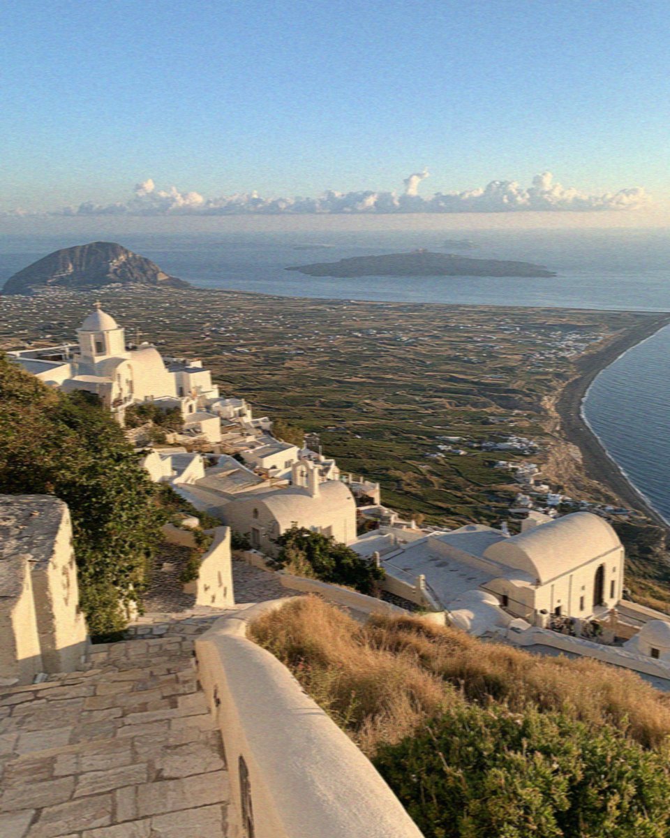The view from Pyrgos over the vineyards and the plain of Santorini to the sea